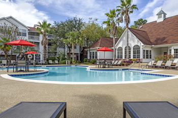 Resort-style swimming pool with sundeck